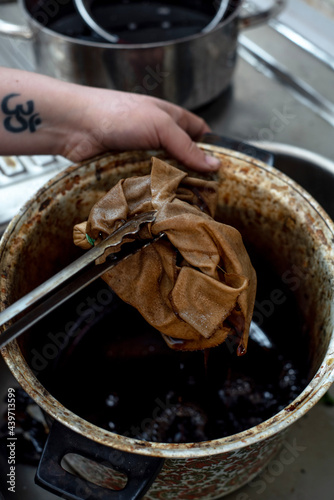 Processing a yellow cloth into iron mordant photo