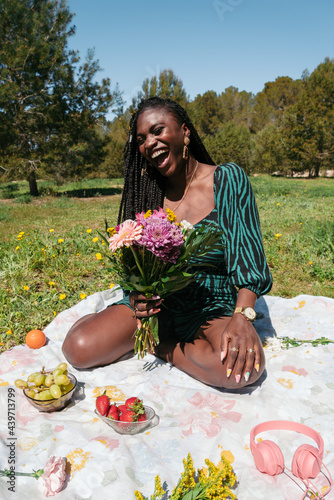 Laughing woman in the park photo