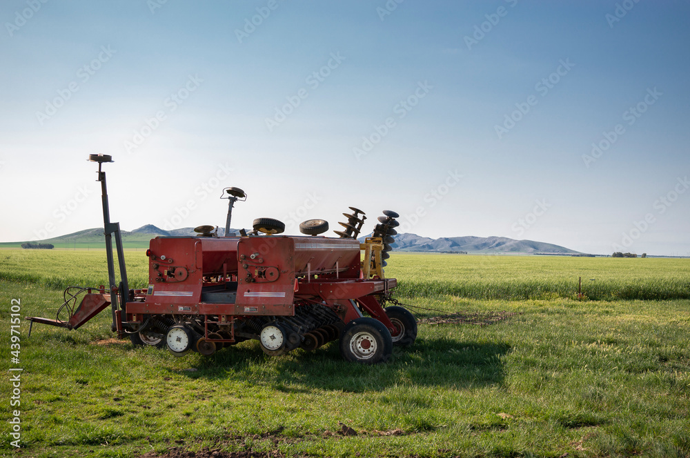 Fototapeta premium seeder machine in a field