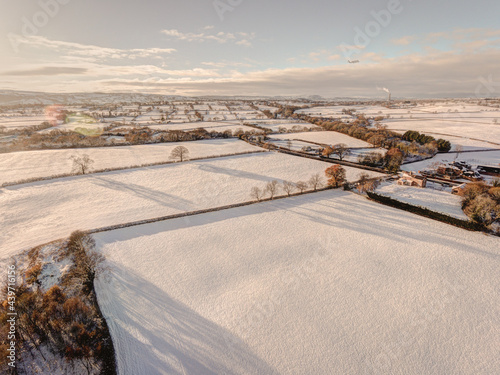 Snow covered fields in rural setting