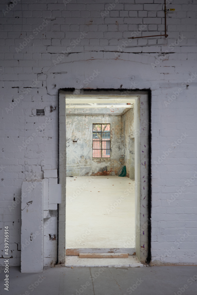 Doorway in empty warehouse Doorway in empty warehouse