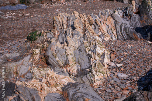 Beautiful rocks on  beach North Cornwall England  near Bude photo