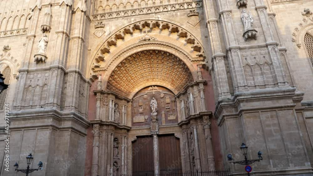 Tilt up shot of facade of Cathedral of St. Mary of Palma, Spain Tilt up shot of facade of Cathedral of St. Mary of Palma, Spain