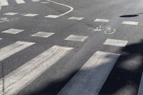 detail of bike path and pedestrian stripes