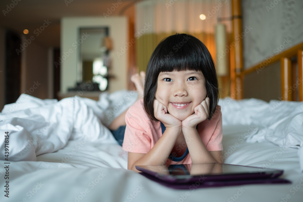 kid is addicted to tablet, little girl playing smartphone, kid use telephone, watching cartoon kid is addicted to tablet, little girl playing smartphone, kid use telephone, watching cartoon