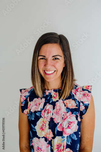 Smiling woman in floral top