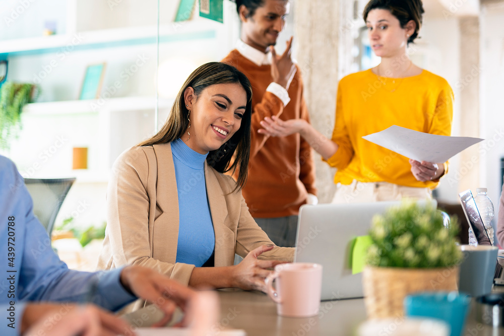 Latin Business Woman Working in Office Latin Business Woman Working in Office
