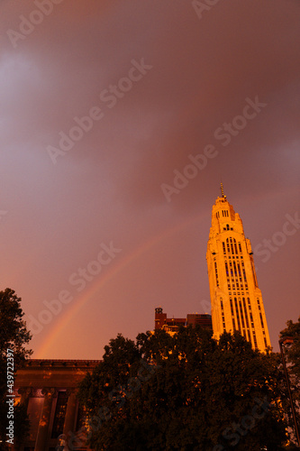 A rainbow and storm cloud over downtown Columbus, Ohio photo