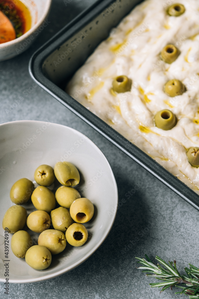 Homemade focaccia with olives and rosemary Homemade focaccia with olives and rosemary