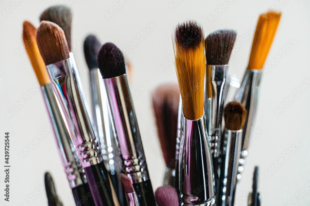 This is a photo of a woman's collection of brushes for make-up This is a photo of a woman's collection of brushes for make-up