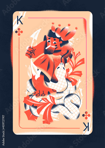 The brave king from playing card deck killing a poisonous snake  photo