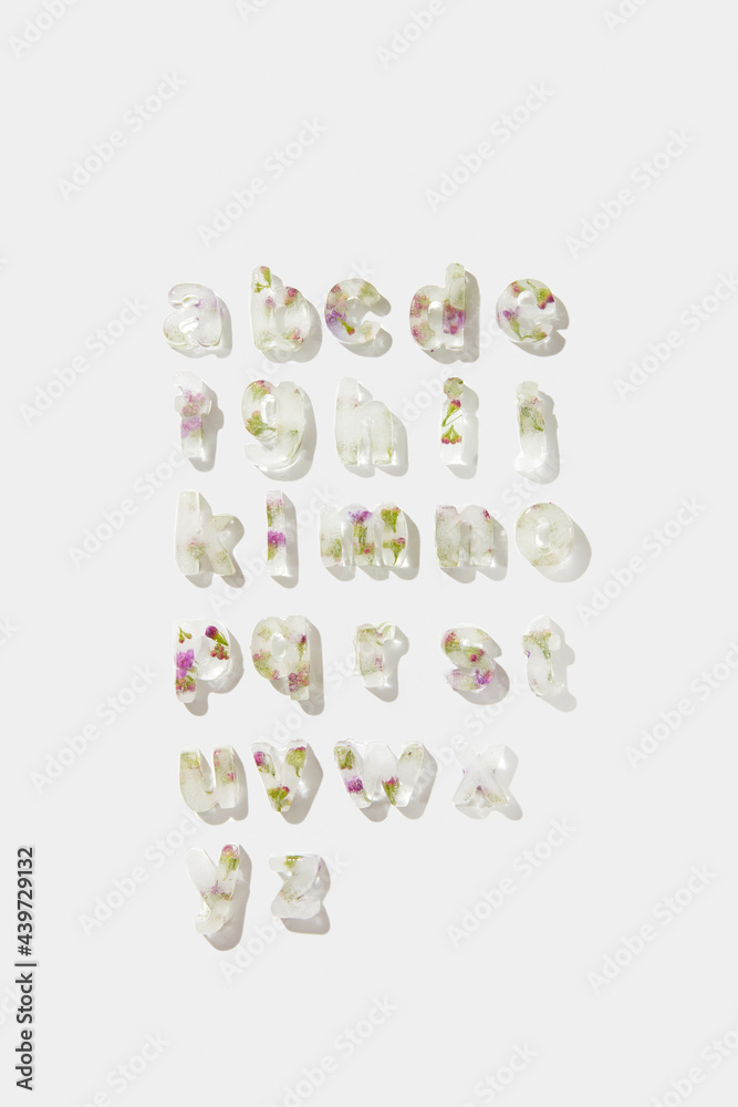 Alphabet letters with small purple flowers Alphabet letters with small purple flowers