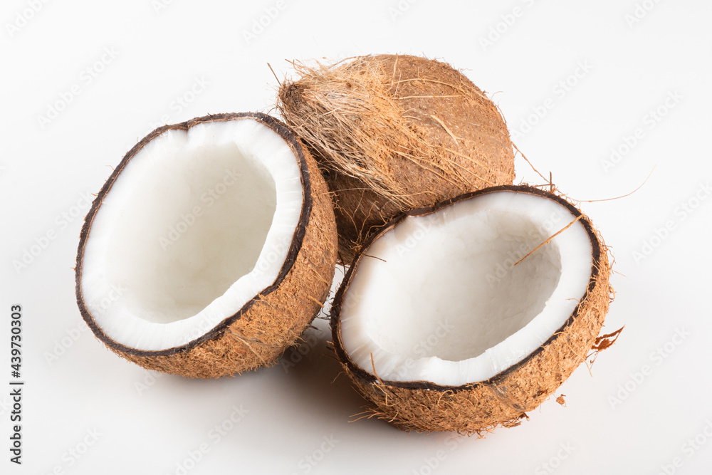 Broken dry coconut isolated on white background. Broken dry coconut isolated on white background.