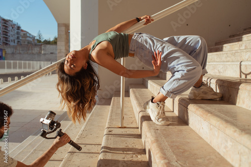 Movie maker on set with a dancer photo