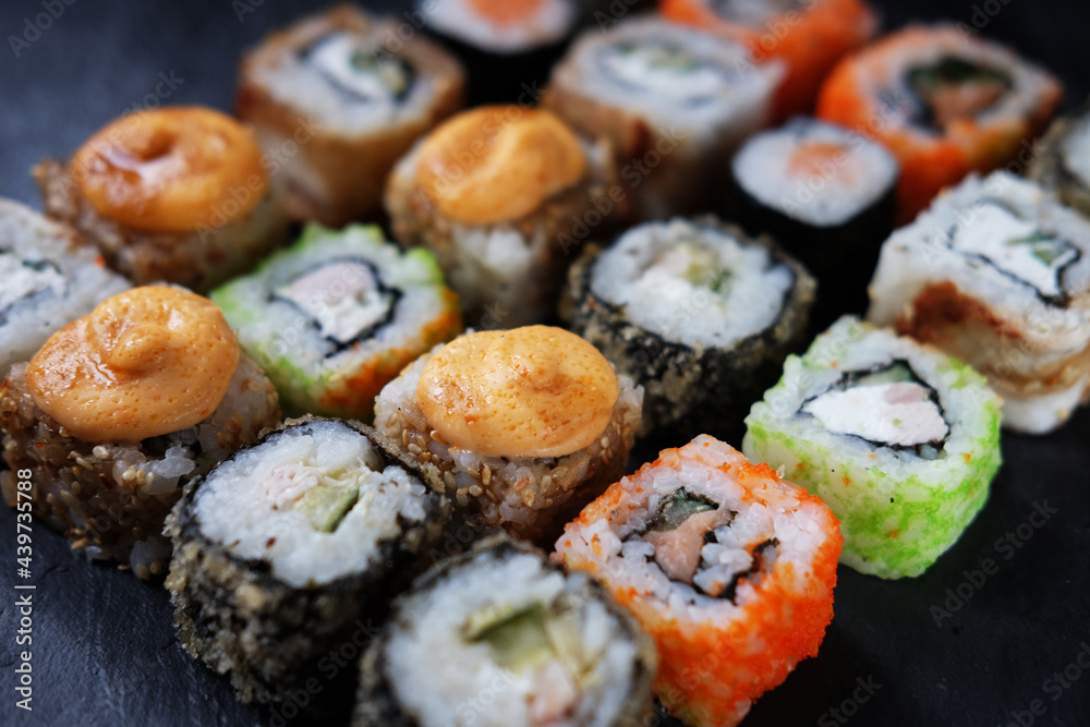 Japanese sushi food. Maki ands rolls with tuna, salmon, shrimp, crab and avocado. Japanese sushi food. Maki ands rolls with tuna, salmon, shrimp, crab and avocado.