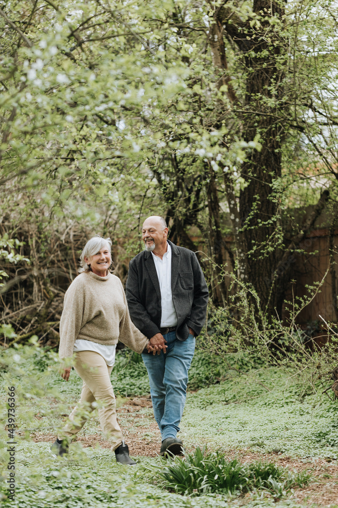 Happy Couple Walking in Park Happy Couple Walking in Park