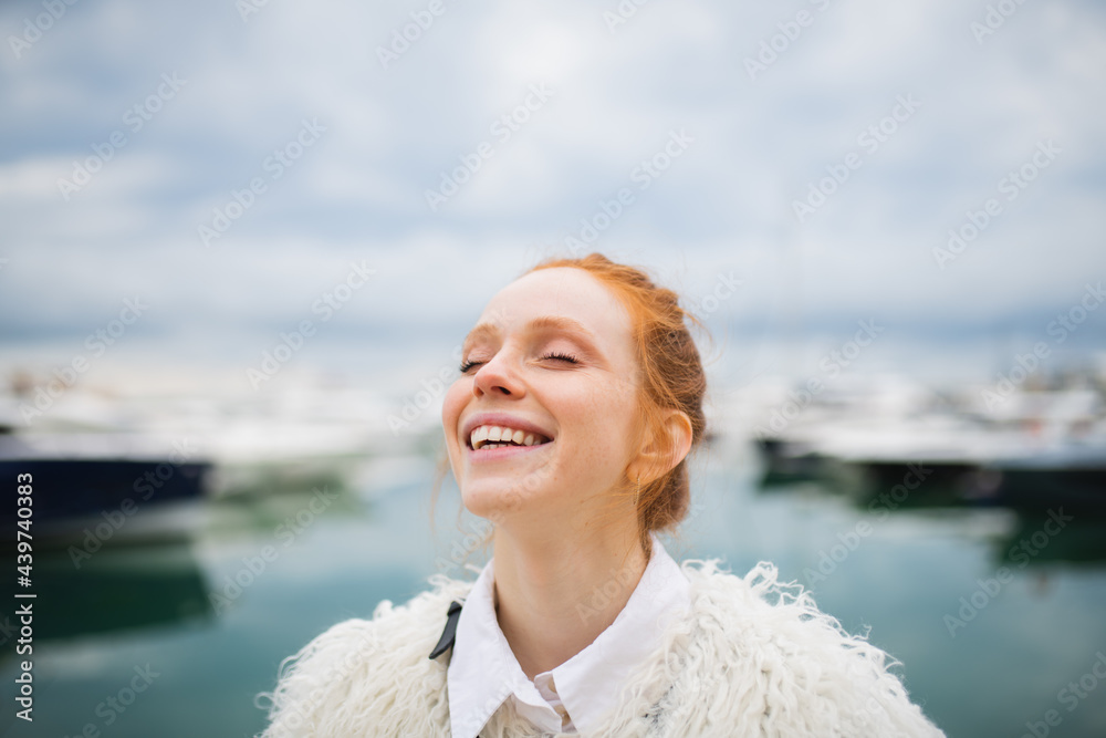 © Laika One/Stocksy - Red-Haired Girl In A White Dress © Laika One/Stocksy - Red-Haired Girl In A White Dress