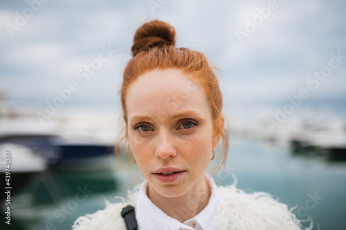Red-Haired Girl In A White Dress photo