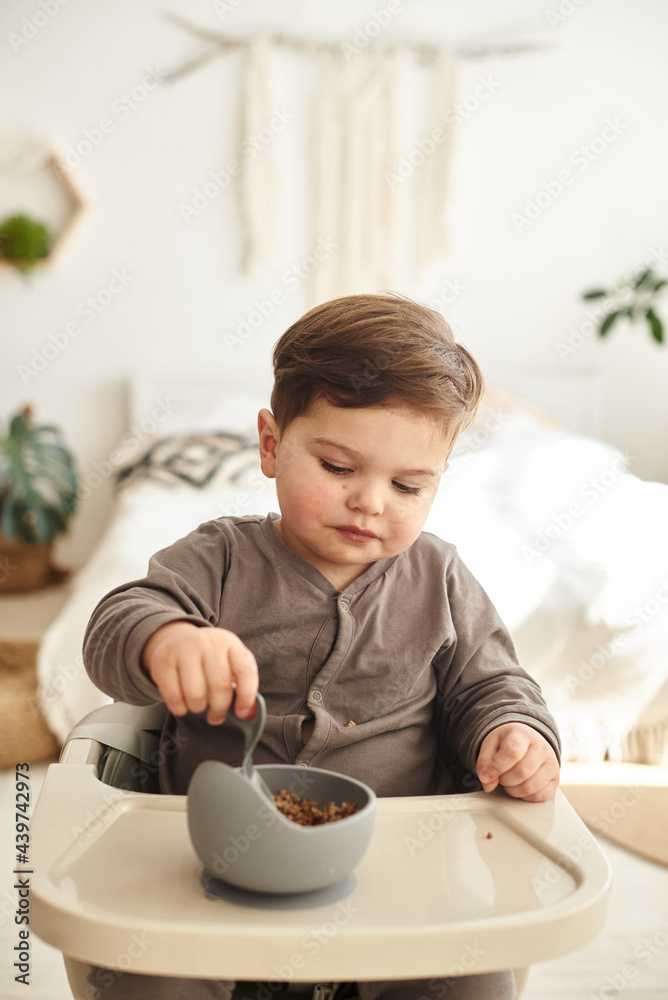 boy with a gray plate