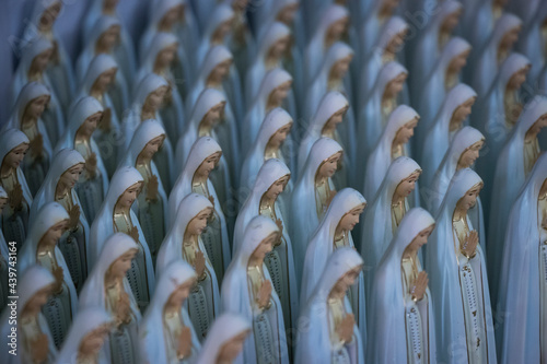 Virgin Mary statues.