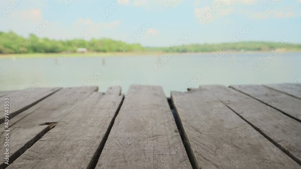 Old wood table bar with nature water and tree bokeh background, Top wooden pattern have empty or free space for products show and and clear blue sky, Landscapes view and copy space, Handheld shot.
Old wood table bar with nature water and tree bokeh background, Top wooden pattern have empty or free space for products show and and clear blue sky, Landscapes view and copy space, Handheld shot.