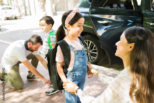 Behave well at school. Mother saying goodbye