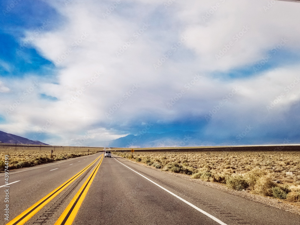 Dramatic view of road with cloudy and smokey sky from nearby fires Dramatic view of road with cloudy and smokey sky from nearby fires