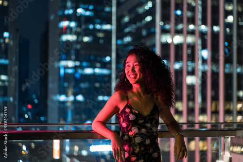 Girl before night cityscape