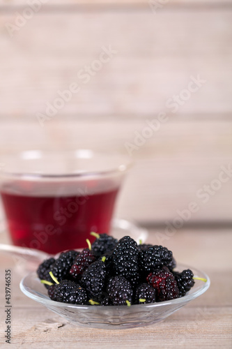 Fresh mulberries and soaked mulberry water