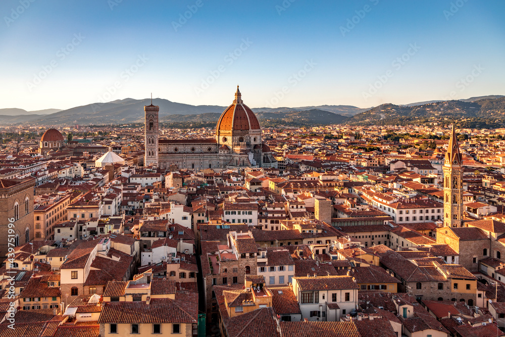 Florence, Italy - 20 June, 2019 : sunset view of Cathedral of Santa Maria del Fiore, known for its red-tiled dome, overview from Arnolfo Tower (Torre di Arnolfo) - 95m-tall medieval tower.