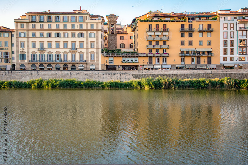 Florence, Italy -20 June, 2019 : view of residential area of the city at the bank of River Arno.