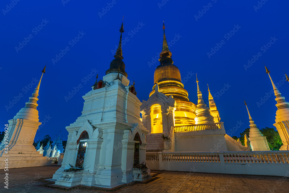 Wat Suan Dok is a Buddhist temple (Wat) at twilight night sky background is a major tourist attraction in Chiang Mai Northern Thailand.Travels in Southeast Asia. Wat Suan Dok is a Buddhist temple (Wat) at twilight night sky background is a major tourist attraction in Chiang Mai Northern Thailand.Travels in Southeast Asia.