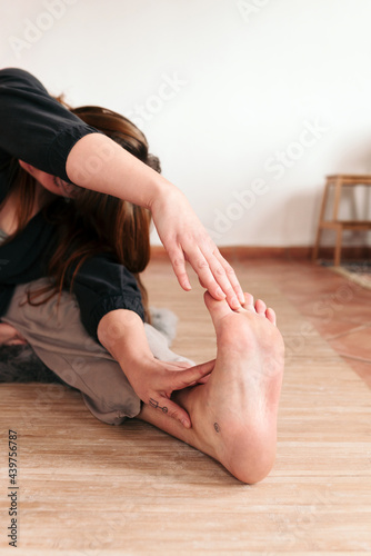 Stretching before yoga photo