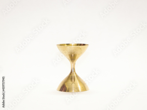 Photography Closeup of an antique gold candleholder isolated on a  white background