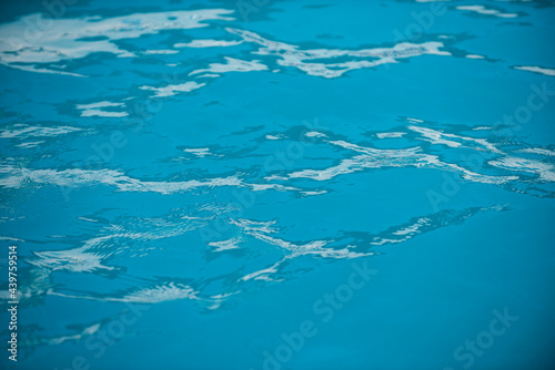 Water in swimming pool  background with high resolution. Wave abstract or rippled water texture.