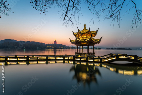 beautiful hangzhou in sunset and ancient pavilion