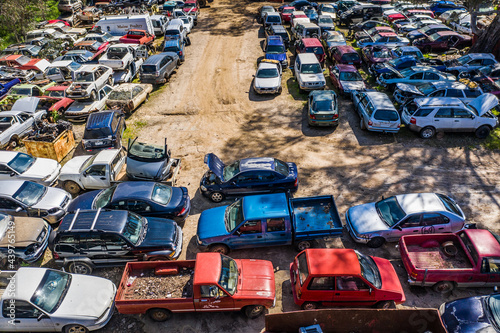 Aerial view of damaged car bodies at an auto wreckers photo