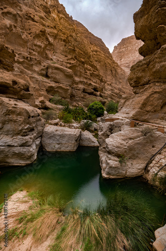 wadi shabs in the sultanate of oman. rocky gorge along the path way to a water spring