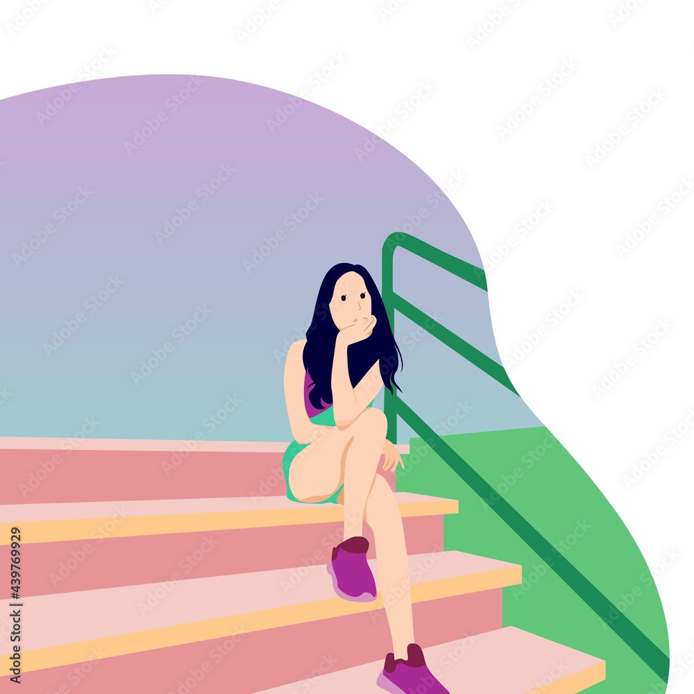 Beautiful woman sitting on stairs