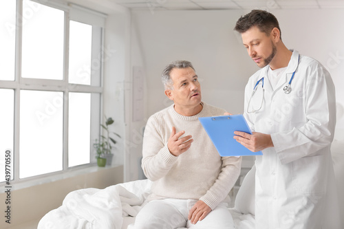 Doctor and mature man under...