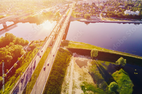 Cityscape of Gomel, Belarus. Aerial view of town architecture. Bridge over Sozh river at sunset, bird eye view photo
