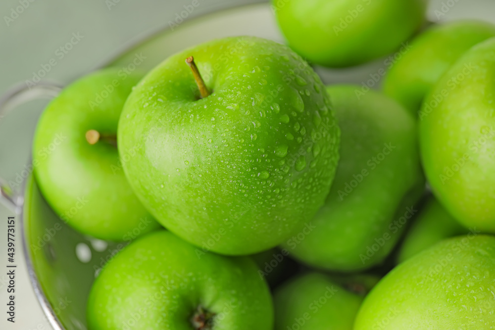Colander with fresh green apples, closeup Colander with fresh green apples, closeup