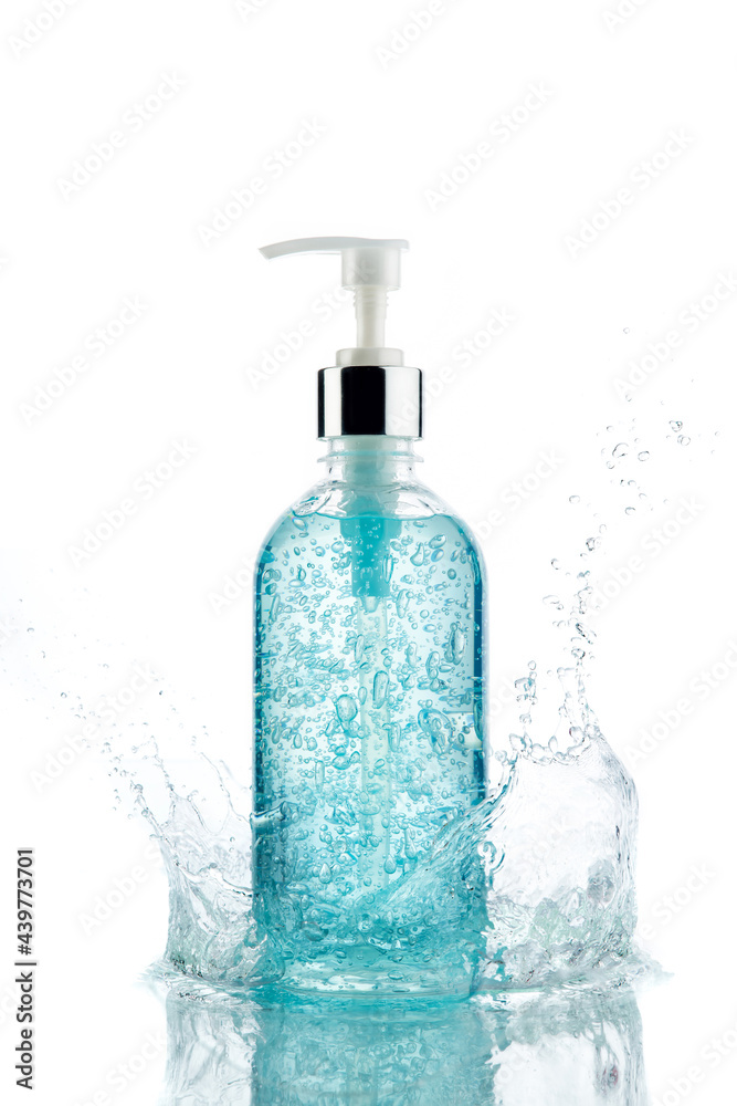 Plastic bottle pump with alcohol hand gel, on white background