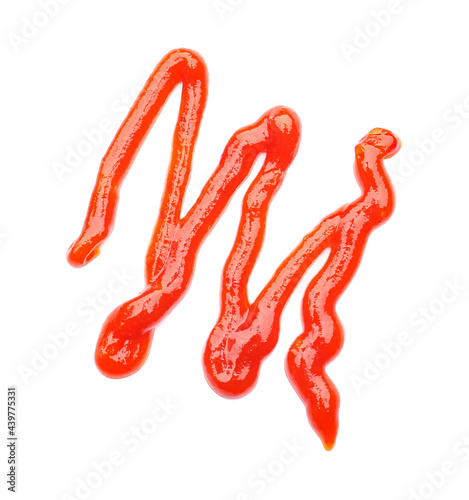 Tasty spilled barbecue sauce on white background