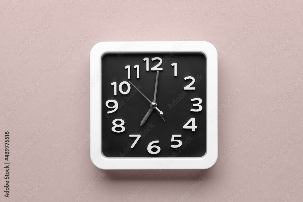 Stylish clock on color background Stylish clock on color background