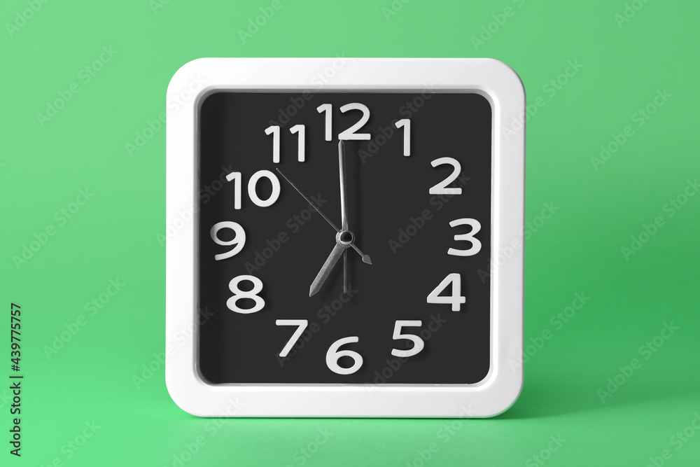 Stylish clock on color background Stylish clock on color background