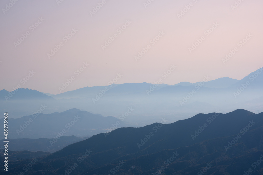 Blue ridge mountains with orange sky. Horizontal image