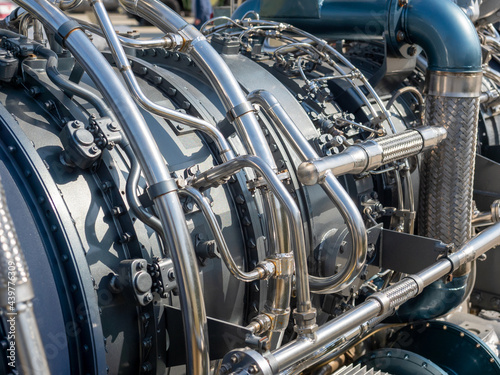 Close-up of the new engine for the ship. Mechanism with a bunch of pipes and parts