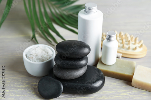 Set of spa supplies on wooden background