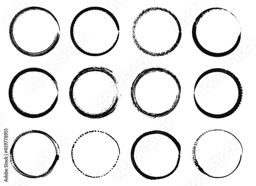 Grunge circle frames. Black ink brush round shapes, circular distress textured borders. Hand drawn grungy paint stroke circles vector set. Abstract thick and thin stripe elements isolated